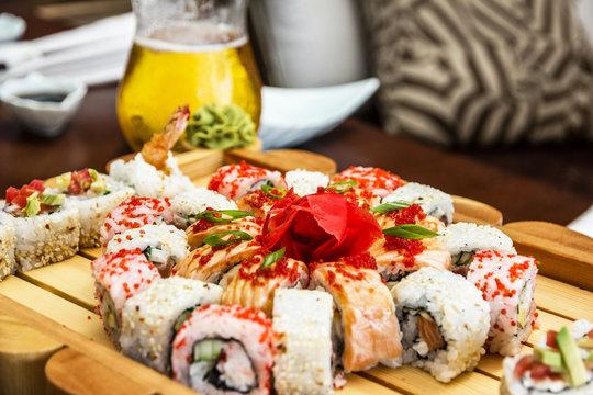sushi rolls caviar mix and beer