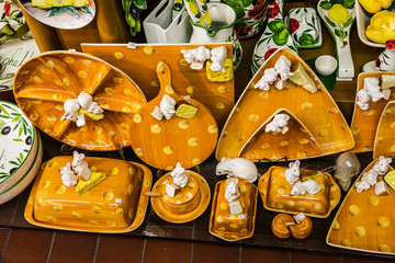 Traditional ware in Lombardy, Italy. Decorated plates for cheese.