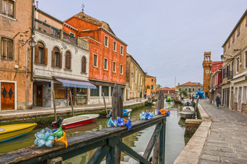 Fototapeta na wymiar Murano island street glass decoration. Venice, Italy.