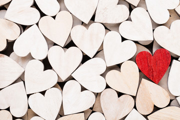 Obraz premium Background with wooden hearts, place for text.
