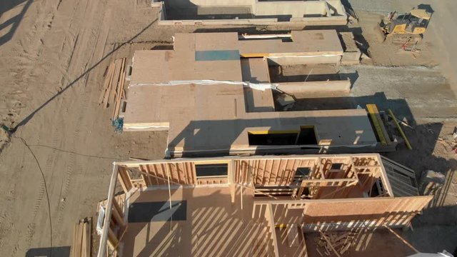 View of Housing fundation being constructed with open basement during sunrise