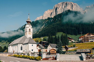 Fototapeta premium Early morning with fog in an alpine village