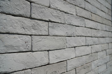 Close-up to white brick wall background.