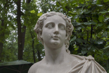 The stone statue is crying.