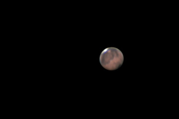 Mars in oppostion 2018, great view at long focal lenght taken with large newtonian telescope, isolated with dark background.