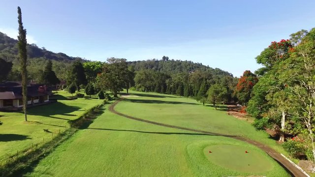 One shot aerial of Hole 1 of the Handara Golf Course in Bedugul Bali Indonesia