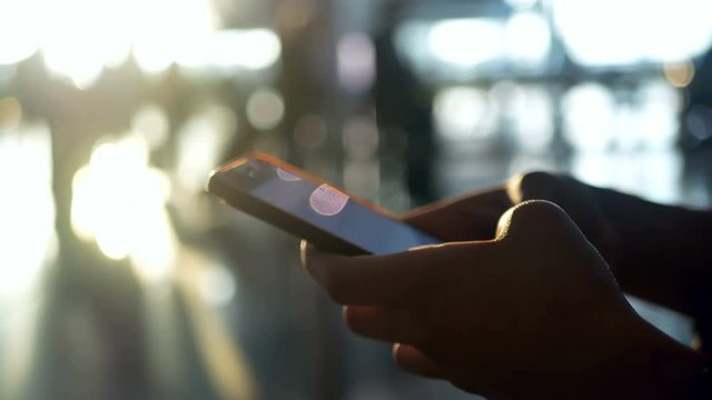 Smartphone airport hand