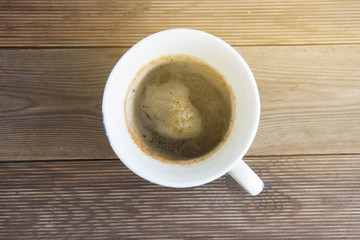 Coffee cup hot drink in vintage old beautiful cup over wooden background. Isolated.