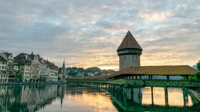 Lucerne city skyline night to day sunrise timelapse at Chapel Bridge, Lucerne (Luzern), Switzerland 4K Time lapse