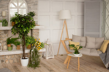 interior in grey and white tones. grey sofa, white lampshade, coffee table