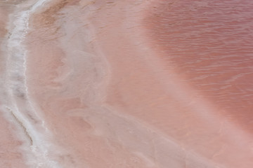 Fototapeta premium Salting swamp, different strata of salt water, gradation of pink 