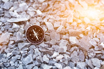 compass on the rock in the morning. - for traveller concept