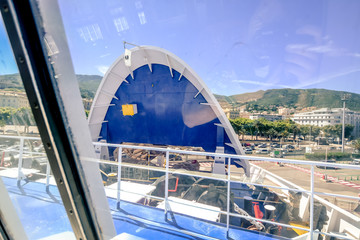 Raised bow of a ship when boarding cars.