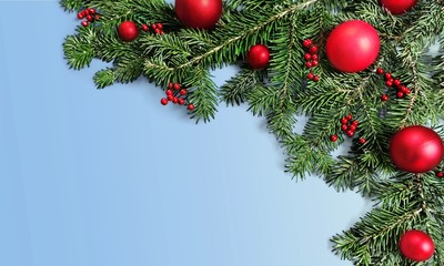 Christmas toys on fir tree branch