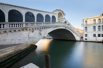 Rialto bridge and The Grand Canal in Venice, nobody in the calm morning, Italy