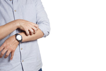 Man scratching his hand, isolated on white background