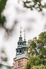 Rosenborg Castle Gardens in Copenhagen, Denmark.  Built in the Dutch Renaissance style in 1606, the castle was used by Danish regents as a royal residence.