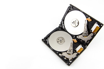 shot of two old technology hard disc drive platter on white background.tif