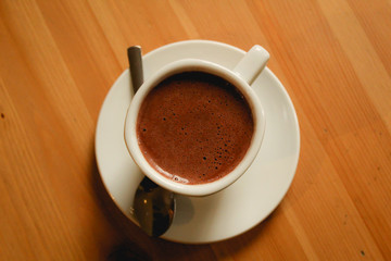 hot chocolate in wooden table