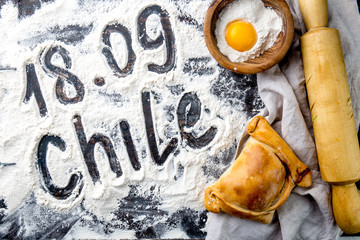 Chilean independence day baking concept. fiestas patrias. Chilean typical EMPANADAS DE PINO for...