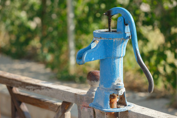The old pump for supplying water to the street