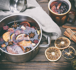 mulled wine in an iron saucepan