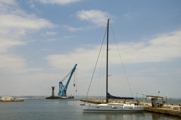 Yacht in the Black Sea port. Privatrovana in the harbor.