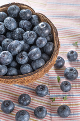 Fresh ripe wild blueberries in bowl. Wild blueberry in top view flat lay with copy space for background or wallpaper. Blueberry is antioxidant food and vitamin C