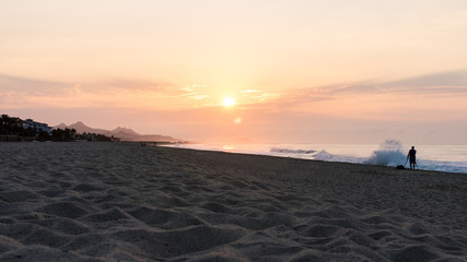 Fototapeta premium A Burnt Sunset in Los Cabos