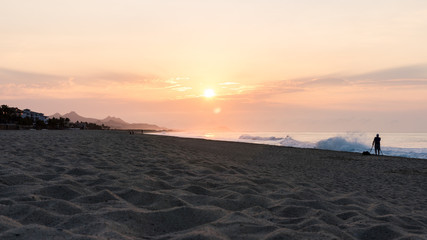 Fototapeta premium A Burnt Sunset in Los Cabos