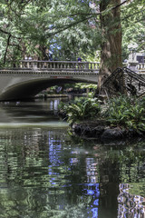Fototapeta na wymiar Bridge over the historic Riverwalk canal in San Antonio, Texas