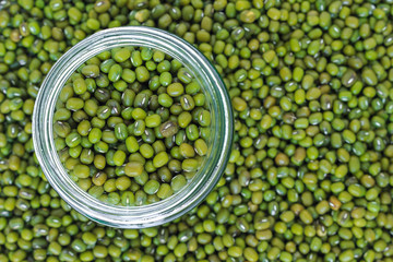 mung bean green in bottle glass on white background