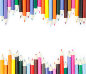 colored pencils drawing multicolored border on white background