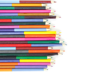 colored pencils drawing multicolored border on white background