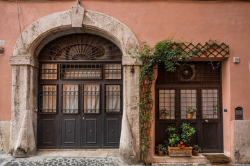 Beautiful doorway in the old district of Trastevere in Rome