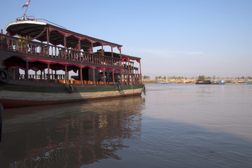 Tonle Sap lake, Siem  Reap Cambodia, sightseeing boat moored at pier