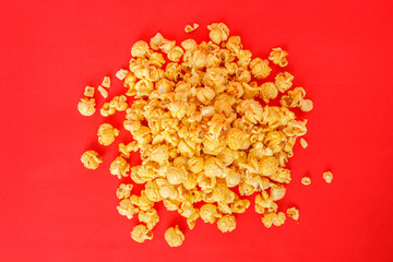 popcorn white pile on red background