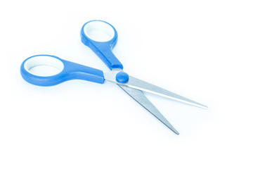 blue scissors cutting on white background