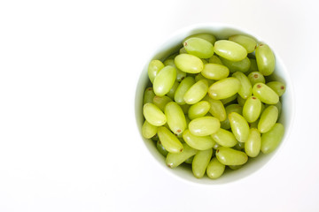 green grape in bowl diet fruit organic on white background