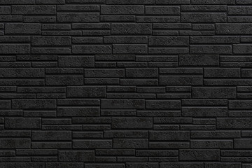 Black modern stone tile wall pattern and seamless background