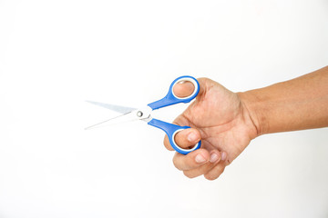 hand red scissors cutting on white background