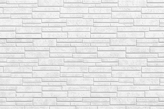 White modern stone tile wall pattern and seamless background
