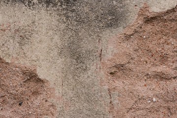 background with old texture of broken cement wall in reddish color