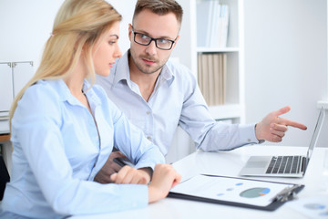 Successful business people working at meeting in office