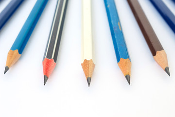 pencil black, blue, brown tool art on white background