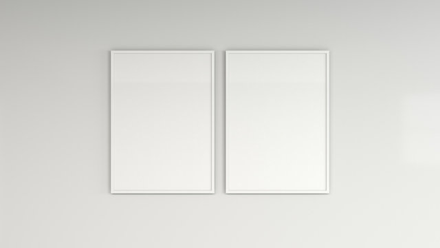Blank white poster in white frame on the wall