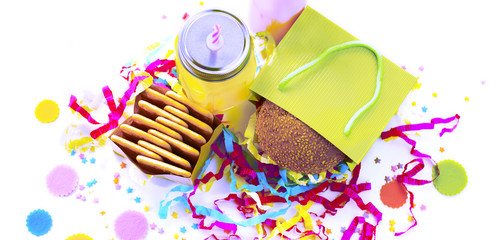 Surrealism Banner Festive composition drinks snacks holiday hamburger cookie tinsel confetti gift box cocktail saturated colors.