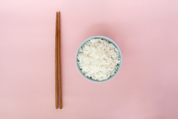 rice in bowl on pink background rose quartz