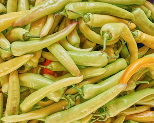 green sweet chilli peppers top view, natural background