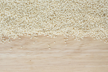 white sesame seed on wood background